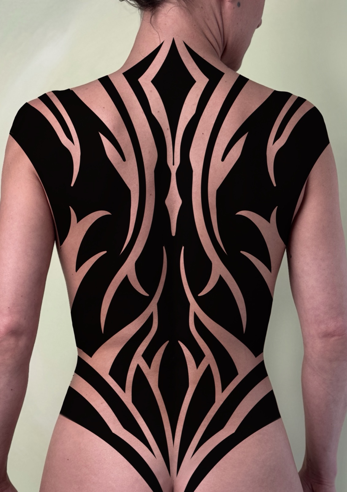 Blackwork back tattoo design, claimable at Si Tattoos, Bristol
