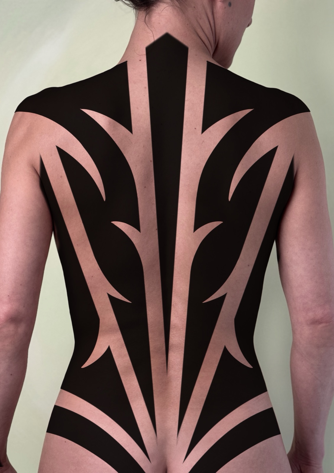 Large blackwork back-piece design, available to book in Bristol